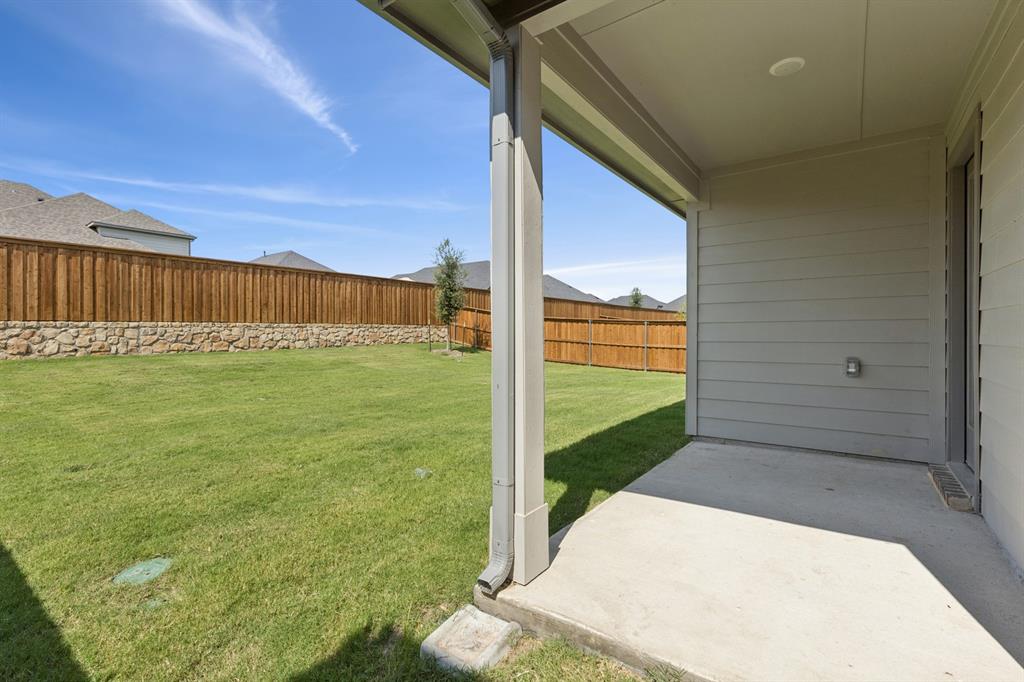 1468 Companero Street Haslet, TX 76052 - Photo 24 of 29 a view of a backyard