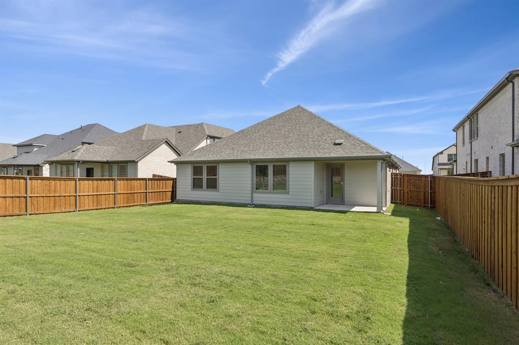 1468 Companero Street Haslet, TX 76052 - Photo 26 of 29 a front view of a house with a yard