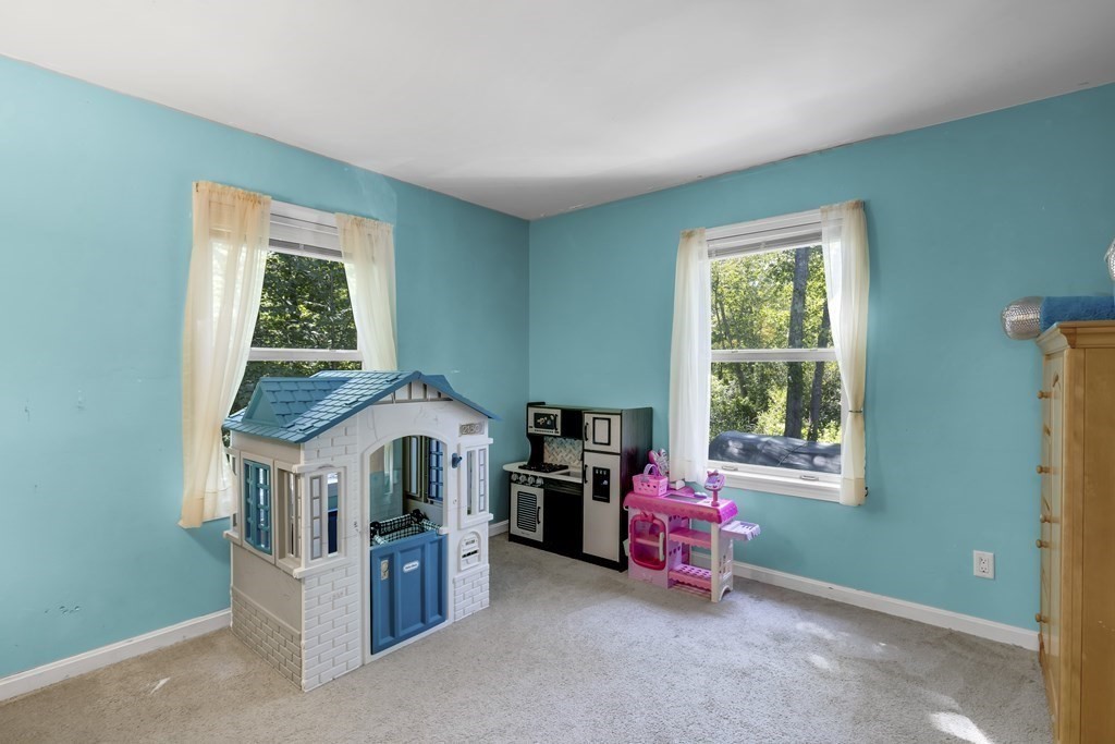 24 Sand Hill Road Salisbury, MA 01952 - Photo 15 of 28 a room with furniture and a window