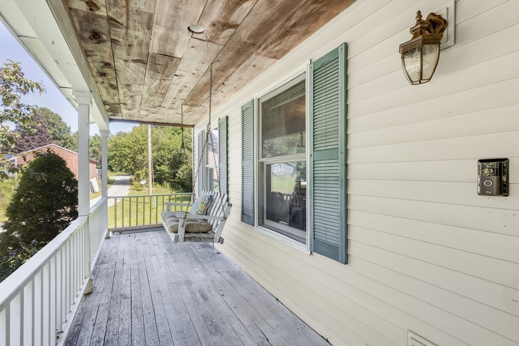 24 Sand Hill Road Salisbury, MA 01952 - Photo 26 of 28 a porch with wooden floor