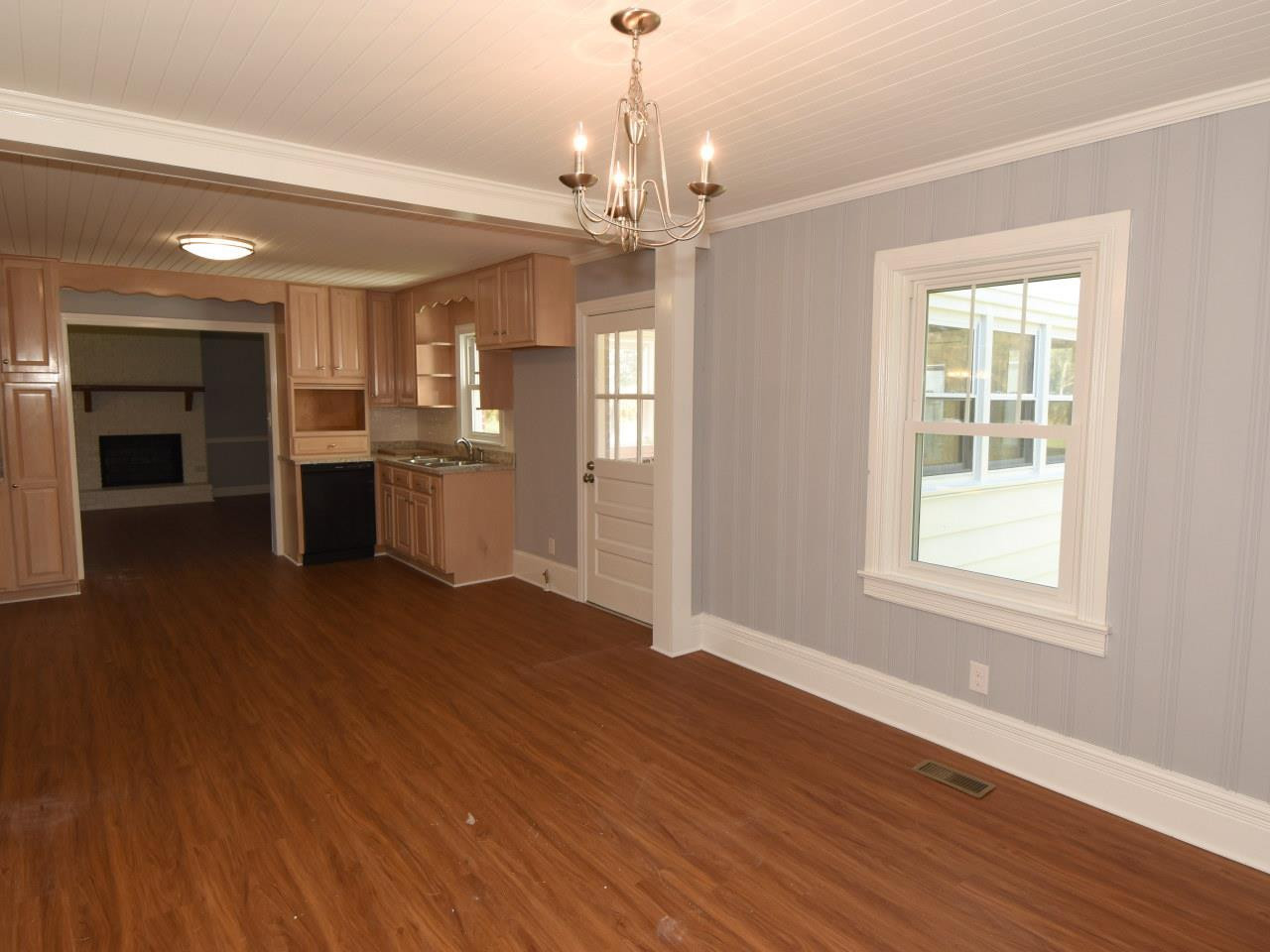 1525 Micro Road Selma, NC 27576 - Photo 20 of 25 New easycare floors, beadboard ceiling, fresh paint, new light fixtures Dining Area