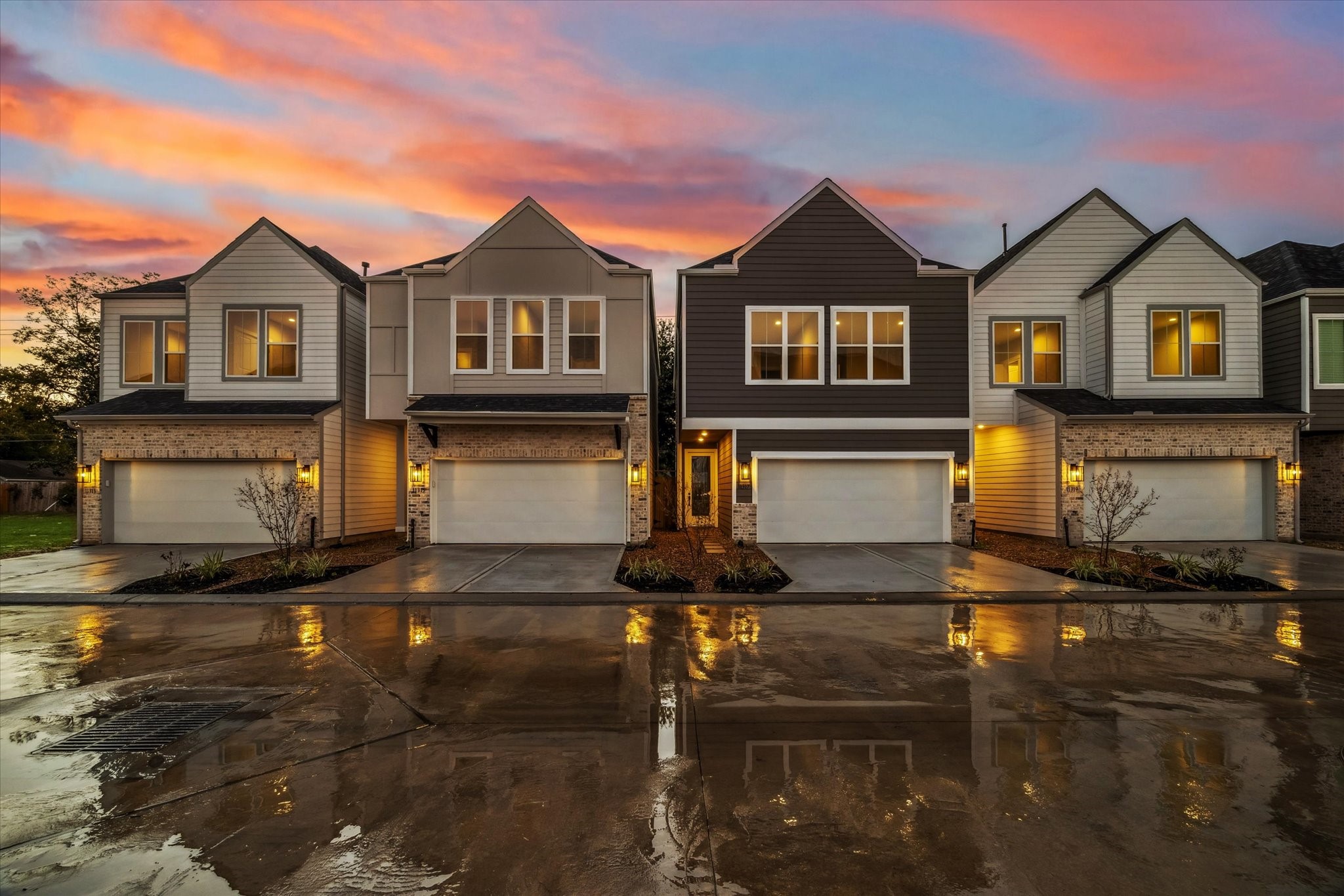11307 Stonework Grove Lane Houston, TX 77076 - Photo 2 of 46 a front view of a house with yard and parking