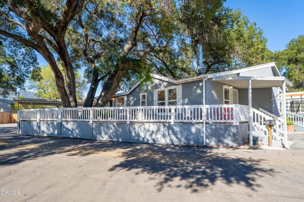1273 South Rice Road, Unit 55 Ojai, CA 93023 - Photo 1 of 1 a view of a house with a yard