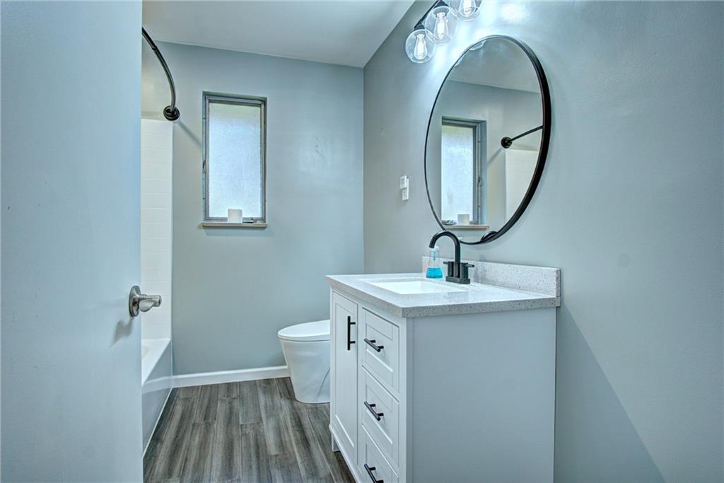 118 Siebert Road Pittsburgh, PA 15237 - Photo 14 of 25 a bathroom with a sink and a mirror