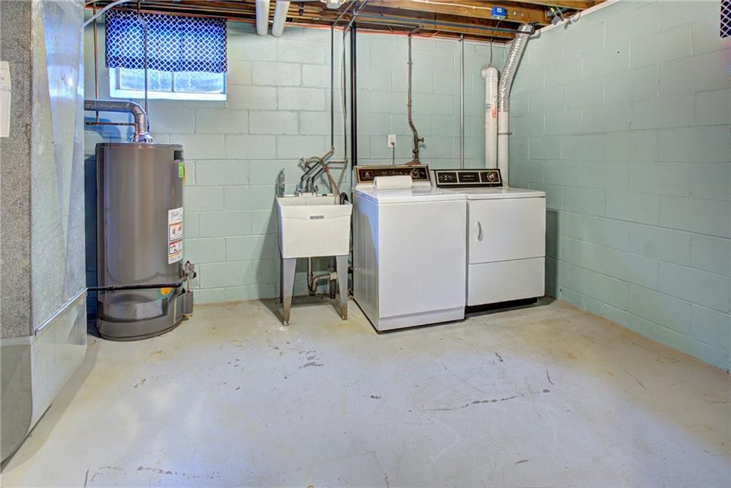 118 Siebert Road Pittsburgh, PA 15237 - Photo 22 of 25 a utility room with dryer and washer