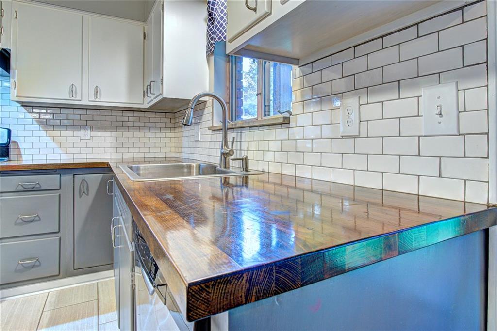 118 Siebert Road Pittsburgh, PA 15237 - Photo 10 of 25 a kitchen with a sink and cabinets