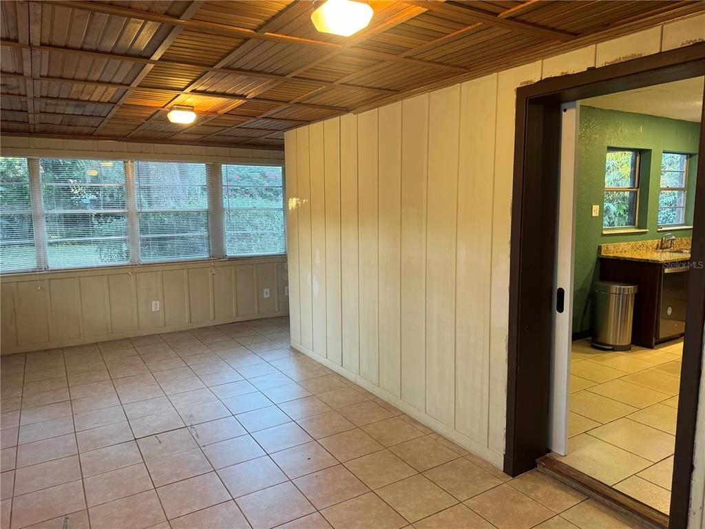 1030 East Walnut Street Lakeland, FL 33801 - Photo 5 of 11 a view of an empty room with a window