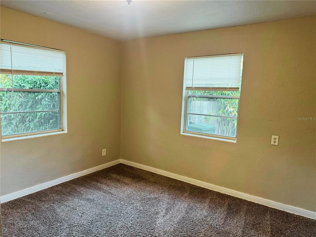 1030 East Walnut Street Lakeland, FL 33801 - Photo 8 of 11 an empty room with a window