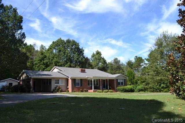 864 State Rd S-29-39 Lancaster, SC 29720 - Photo 22 of 22 a front view of a house with a garden