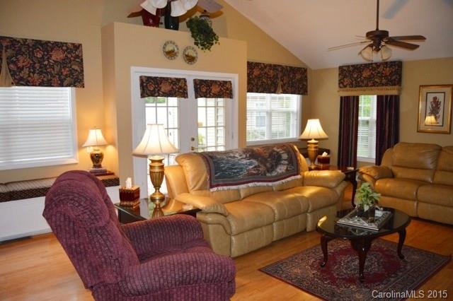 864 State Rd S-29-39 Lancaster, SC 29720 - Photo 7 of 22 a living room with furniture fireplace and a large window