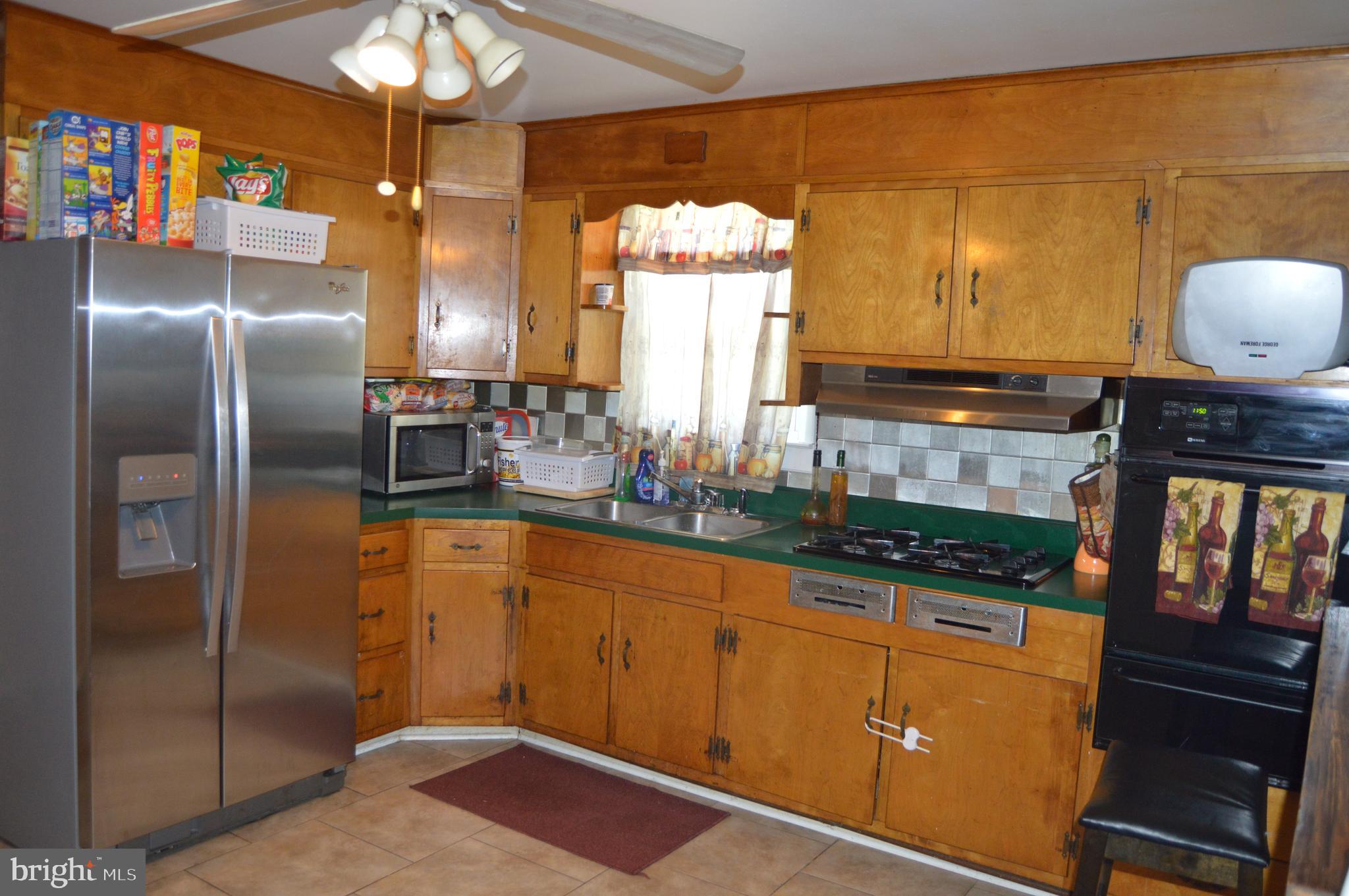 19 Melville Road Pasadena, MD 21122 - Photo 5 of 32 Spacious Kitchen w/newer Appl.