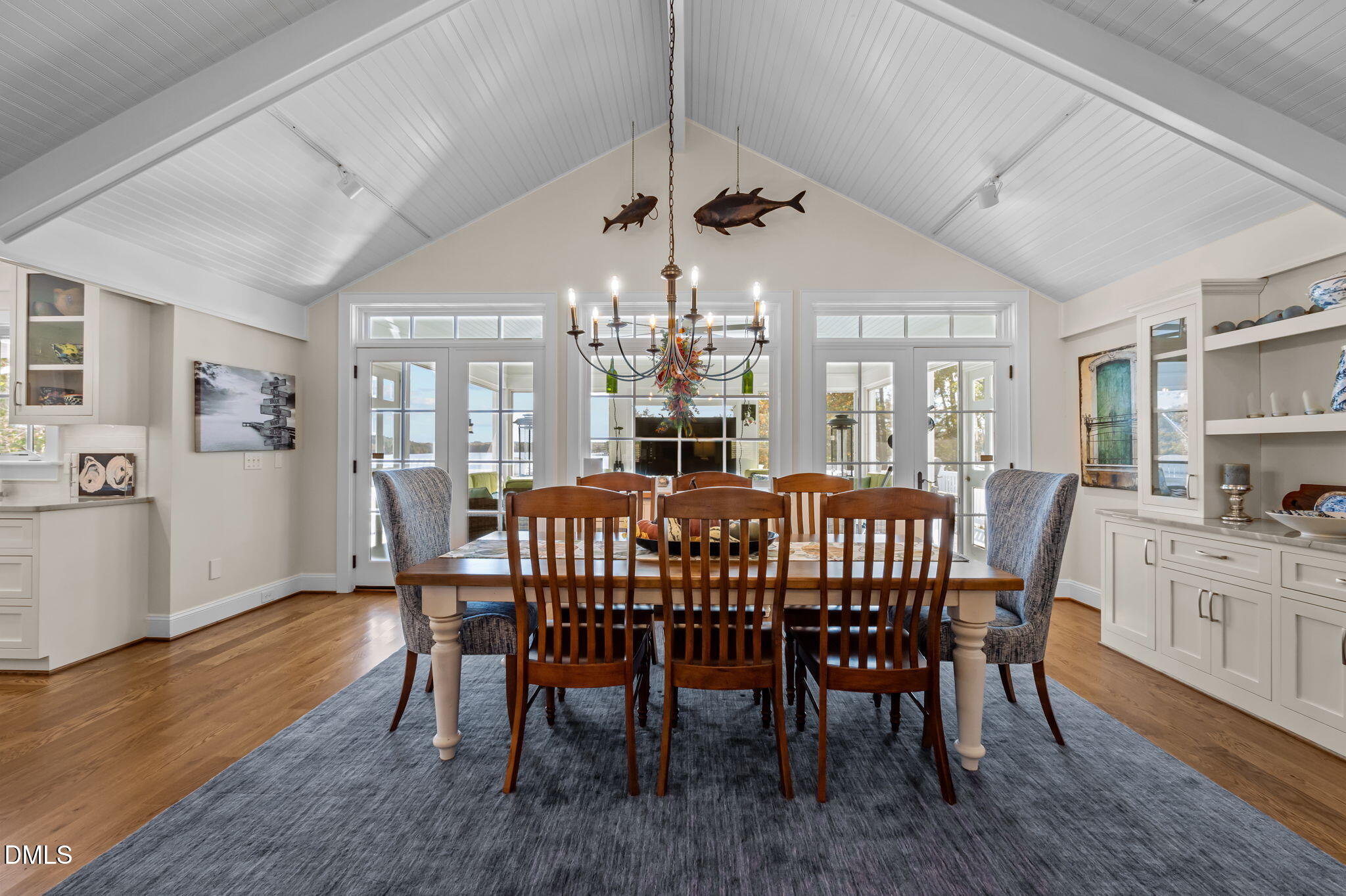 515 Oak Pointe Drive Semora, NC 27343 - Photo 18 of 66 a view of a dining room with furniture window and wooden floor