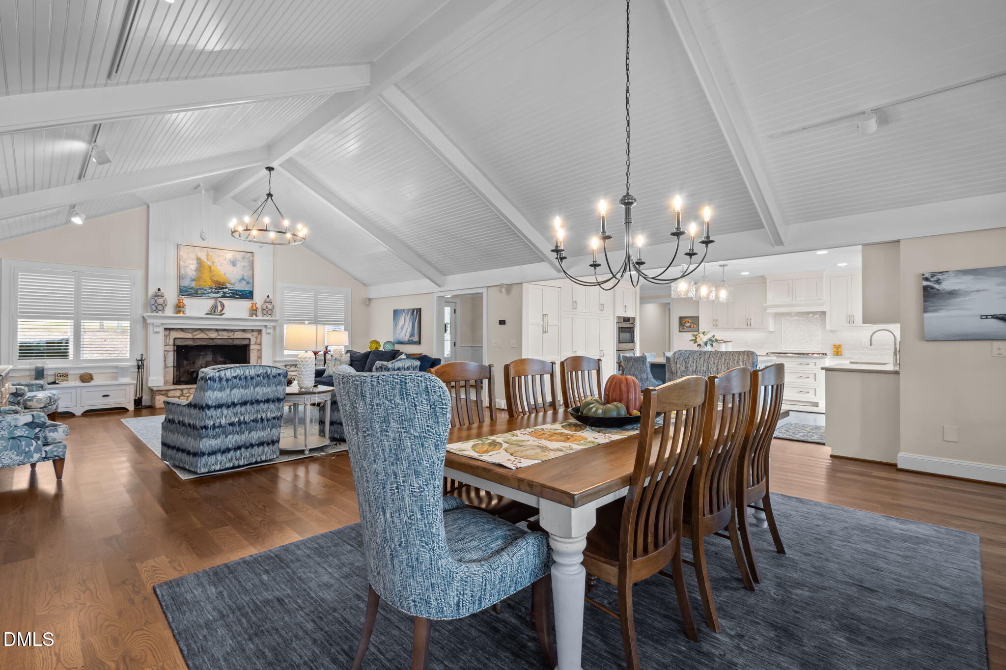 515 Oak Pointe Drive Semora, NC 27343 - Photo 20 of 66 a view of a dining room with furniture wooden floor and chandelier