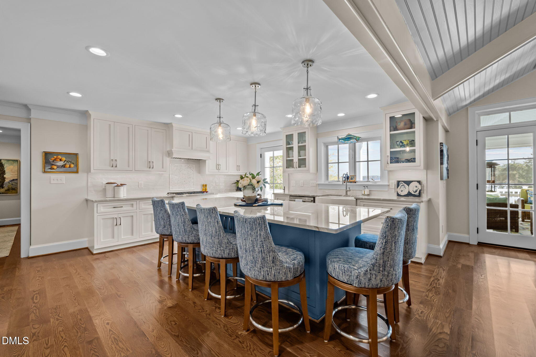 515 Oak Pointe Drive Semora, NC 27343 - Photo 21 of 66 a dining area with stainless steel appliances kitchen island granite countertop a dining table chairs and view living room