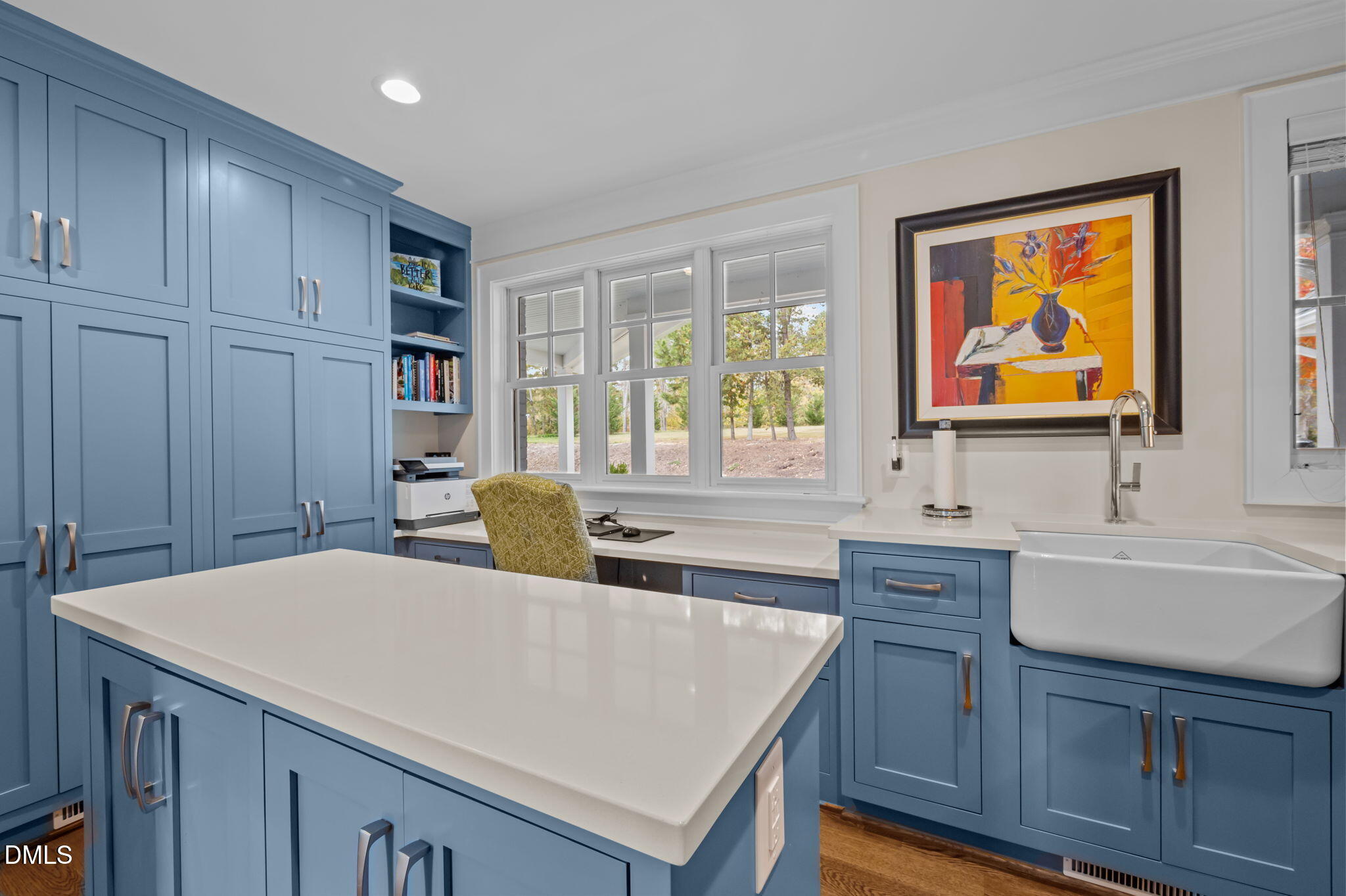 515 Oak Pointe Drive Semora, NC 27343 - Photo 26 of 66 a kitchen with kitchen island a sink table and chairs