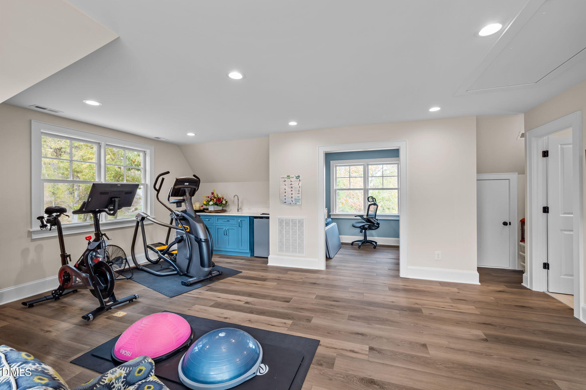 515 Oak Pointe Drive Semora, NC 27343 - Photo 34 of 66 a view of a room with gym equipment