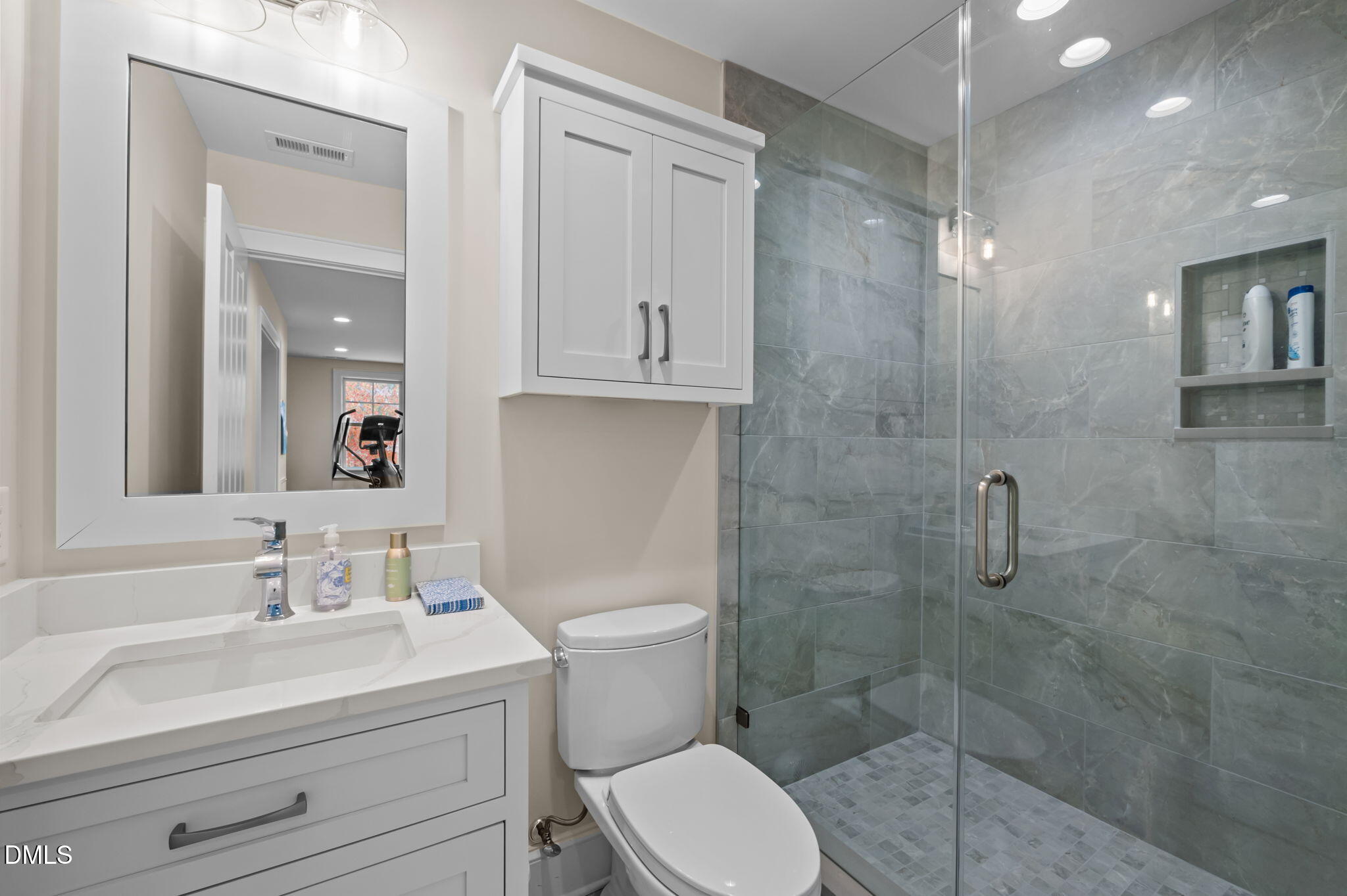 515 Oak Pointe Drive Semora, NC 27343 - Photo 36 of 66 a bathroom with a sink a toilet and shower