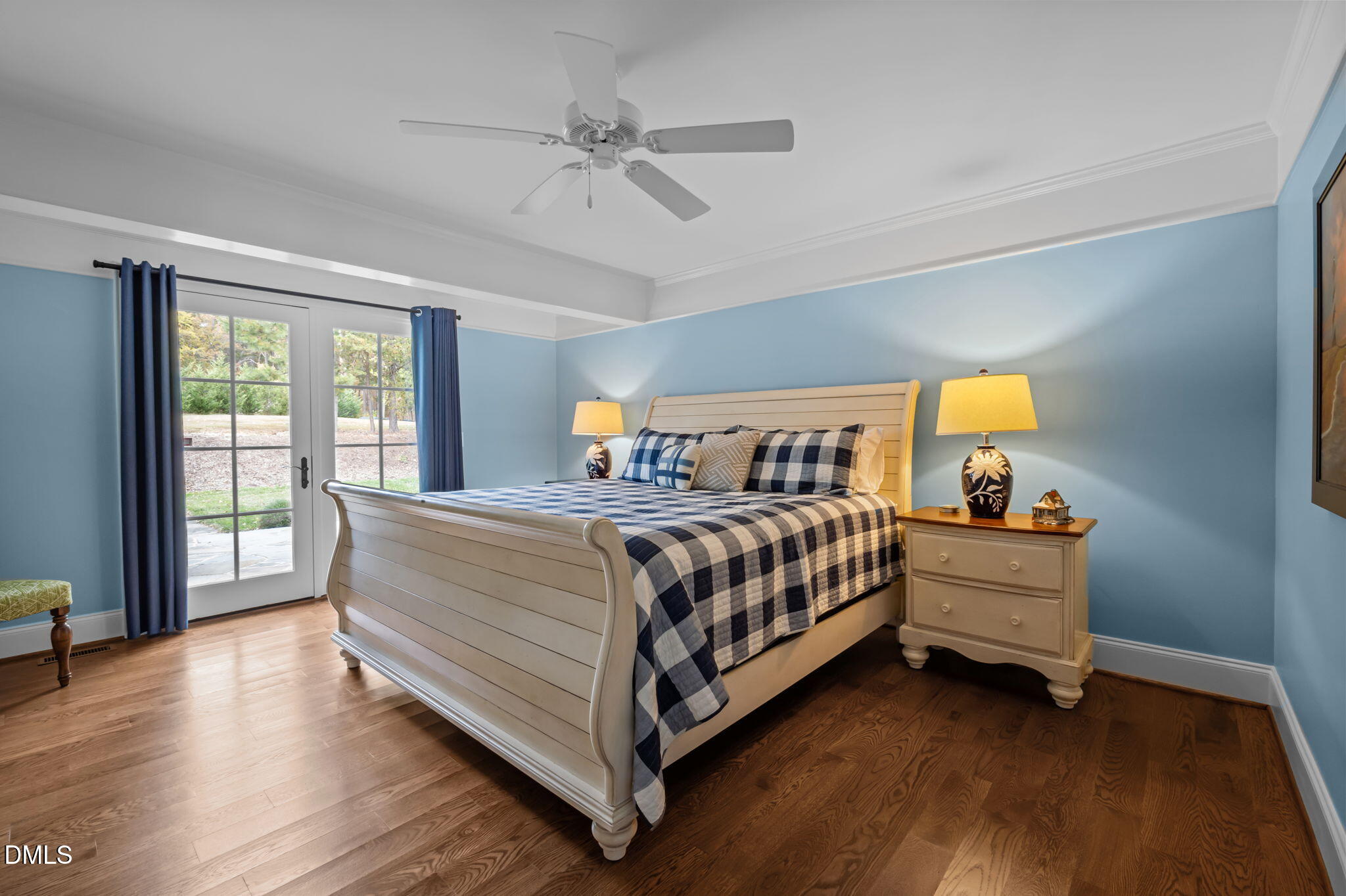 515 Oak Pointe Drive Semora, NC 27343 - Photo 41 of 66 a bedroom with a bed and large windows