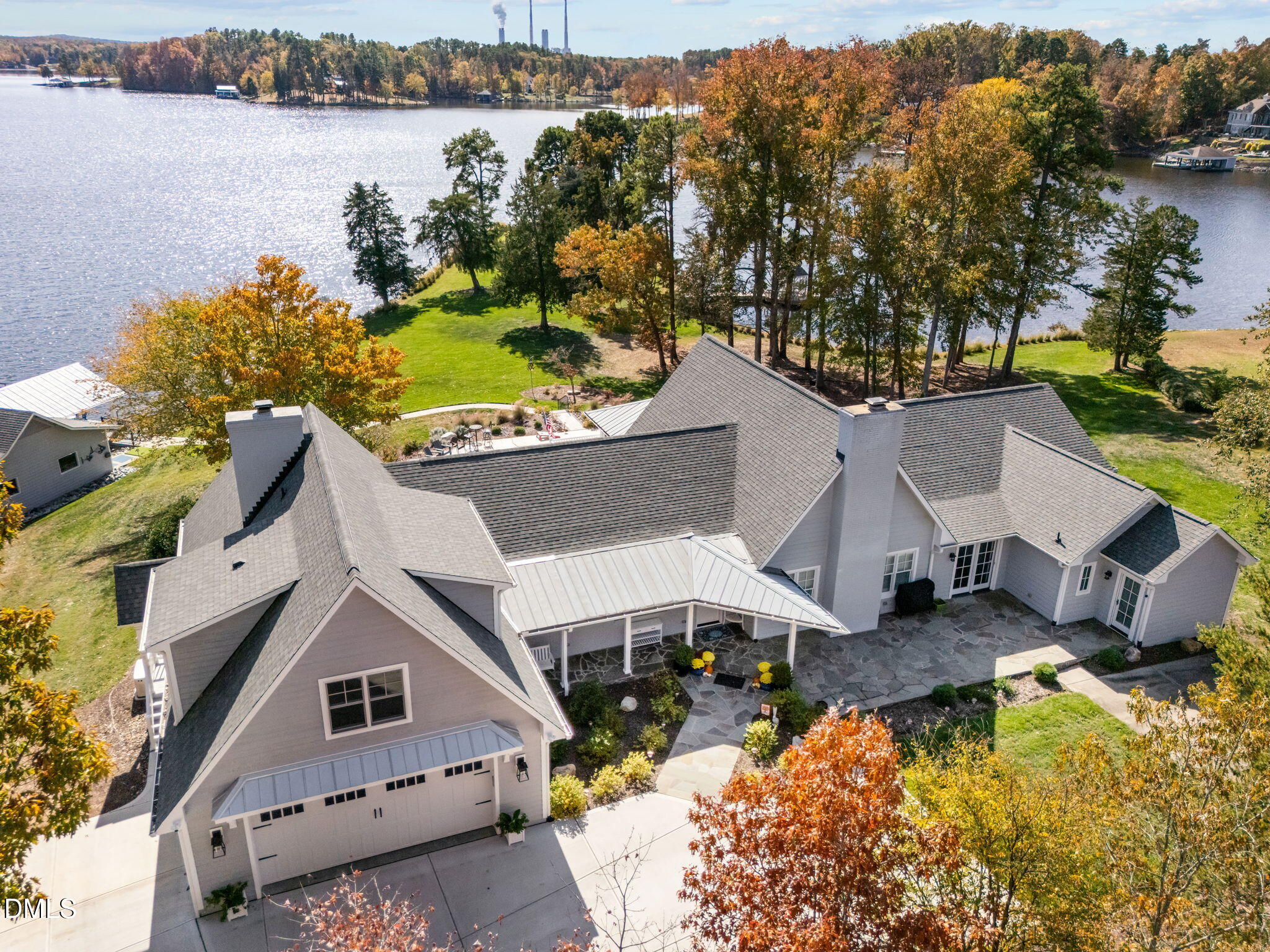 515 Oak Pointe Drive Semora, NC 27343 - Photo 4 of 66 an aerial view of a house with outdoor space and lake view