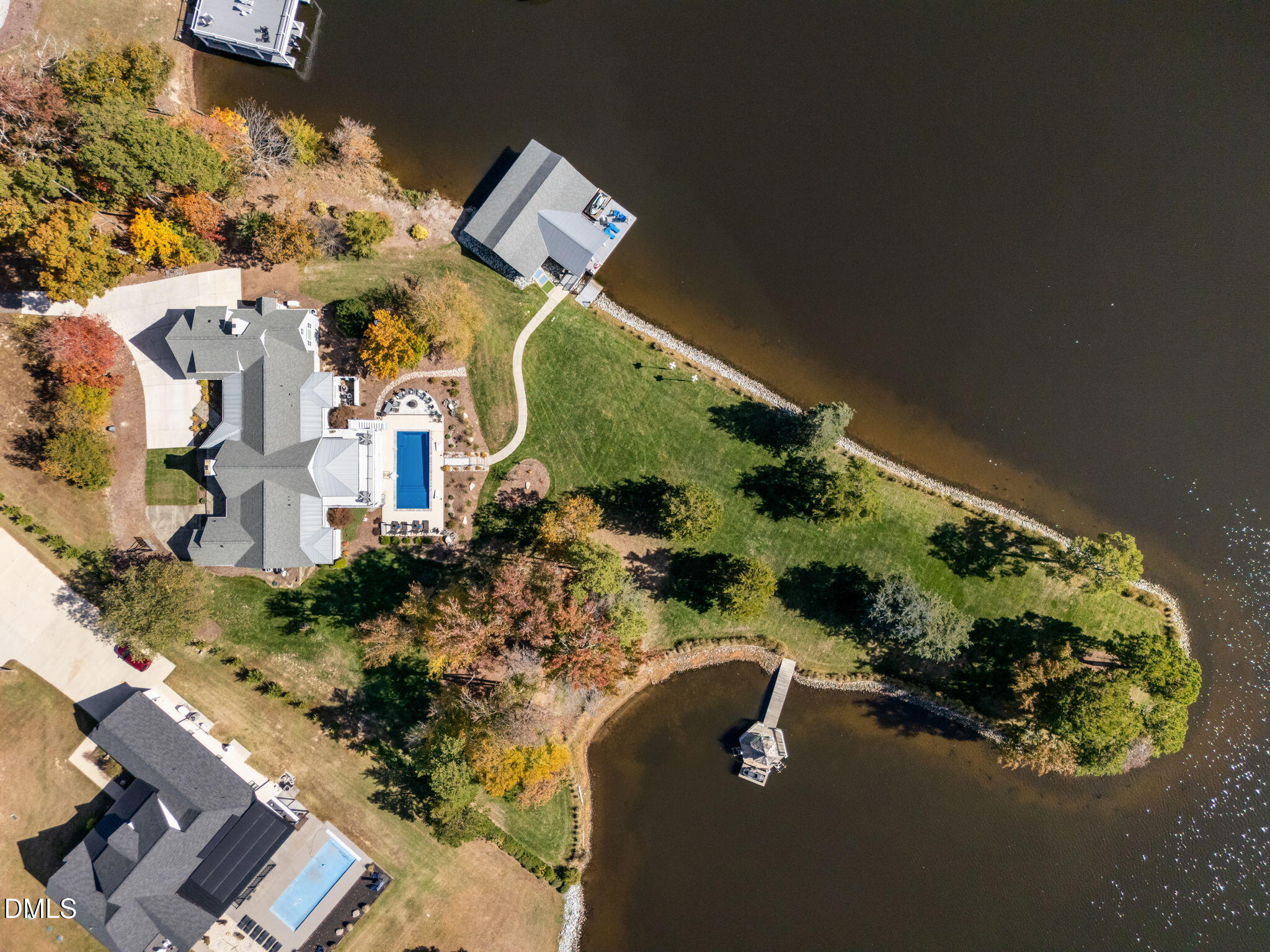 515 Oak Pointe Drive Semora, NC 27343 - Photo 5 of 66 an aerial view of a house with a yard and garden