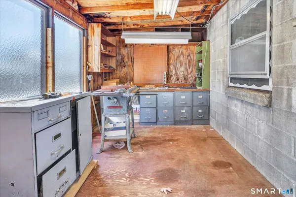 a view of a living room and entryway