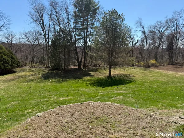 a view of a yard with an outdoor space