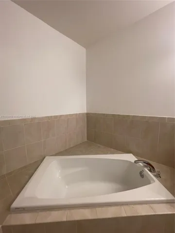 a bathroom with a bathtub