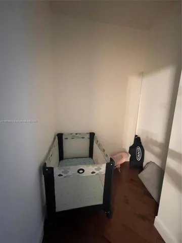 a view of workspace with wooden floor