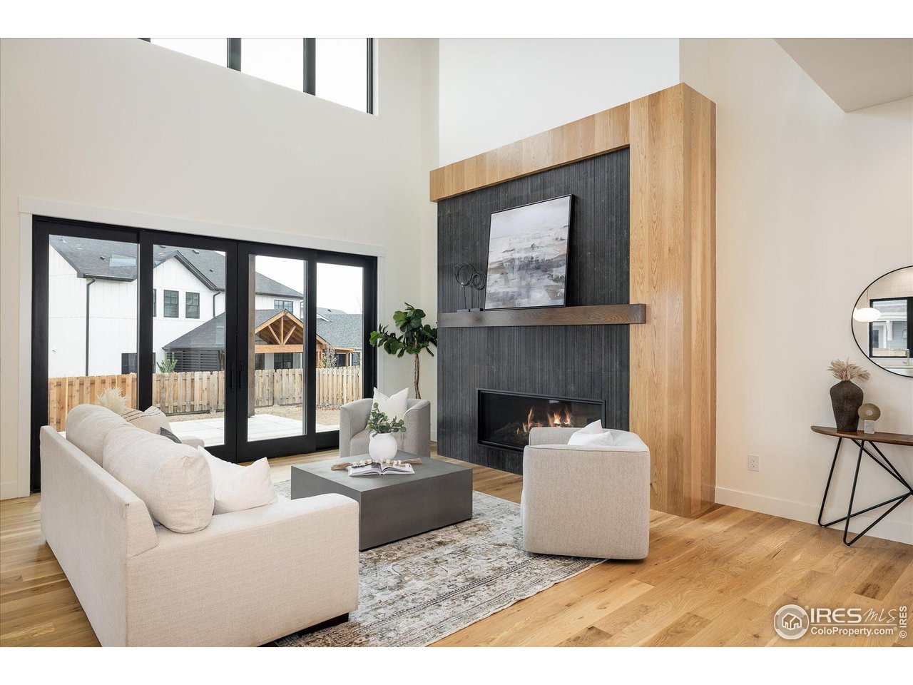 848 Trail Ridge Drive Louisville, CO 80027 - Photo 11 of 48 a living room with furniture and a fireplace