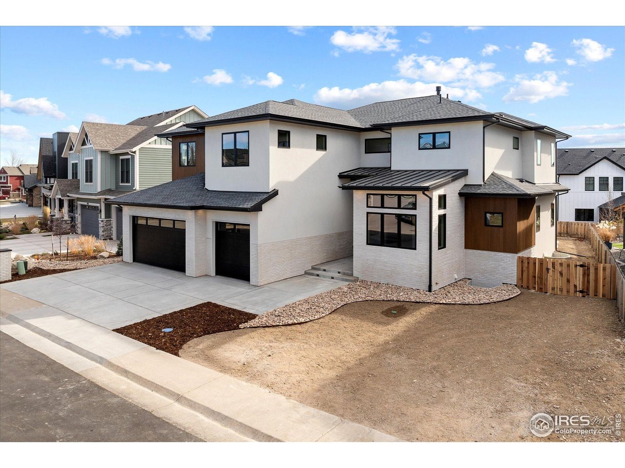 848 Trail Ridge Drive Louisville, CO 80027 - Photo 2 of 48 a view of a house with a patio