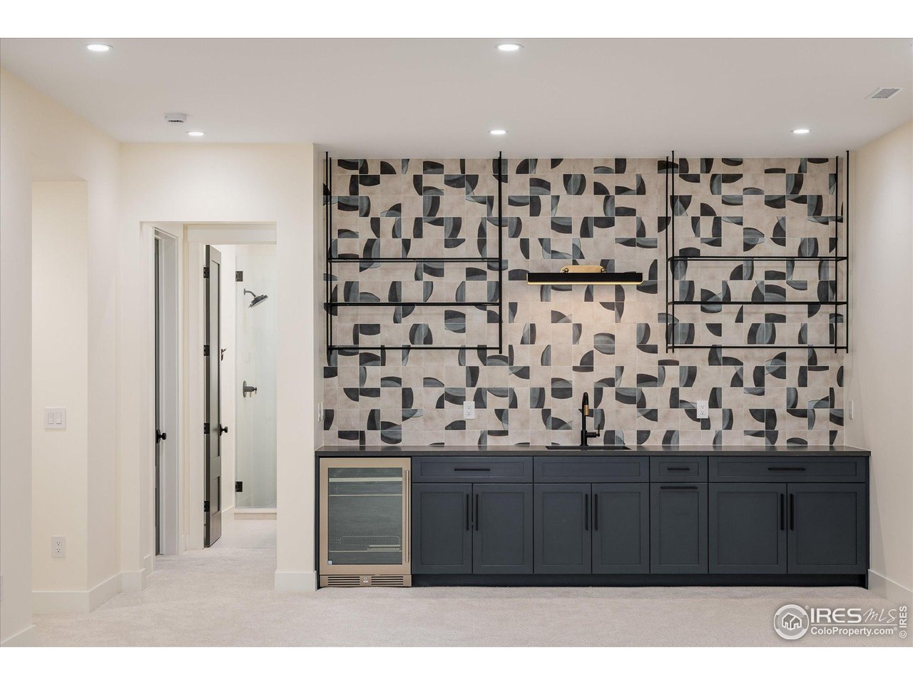 848 Trail Ridge Drive Louisville, CO 80027 - Photo 42 of 48 a kitchen with a sink and cabinets