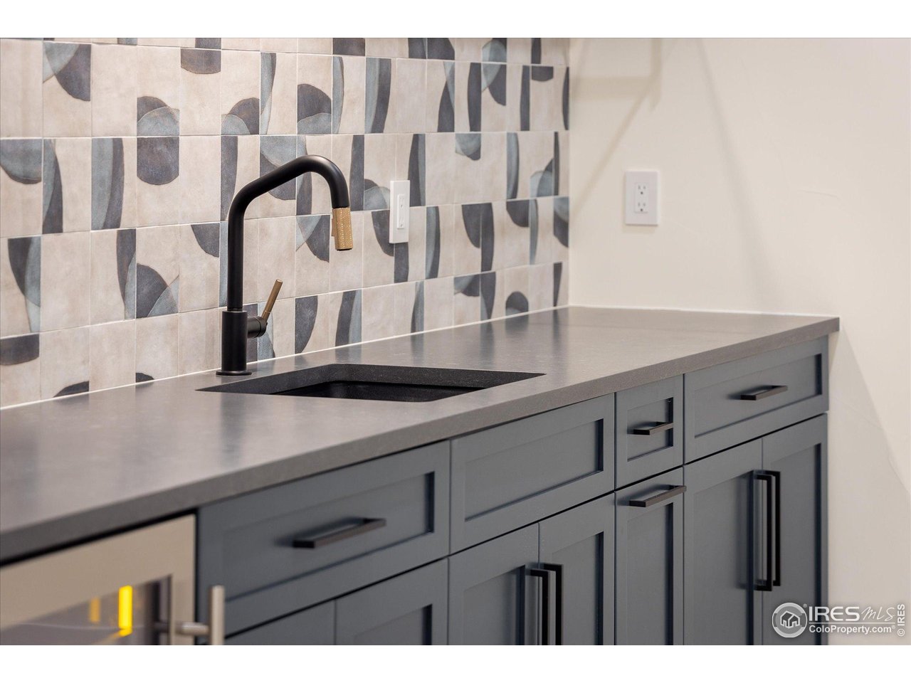 848 Trail Ridge Drive Louisville, CO 80027 - Photo 43 of 48 a view of a kitchen counter top with furniture