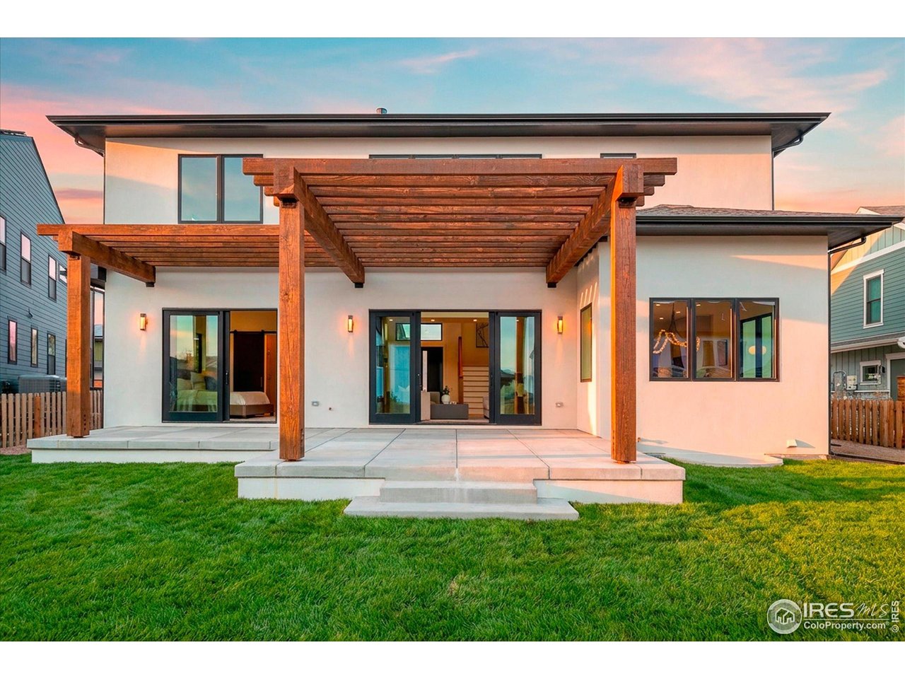 848 Trail Ridge Drive Louisville, CO 80027 - Photo 5 of 48 a view of a house with sitting area and garden