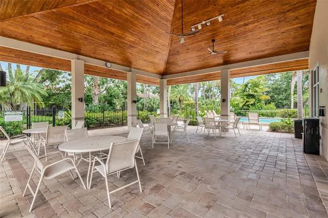 a view of a patio with a backyard