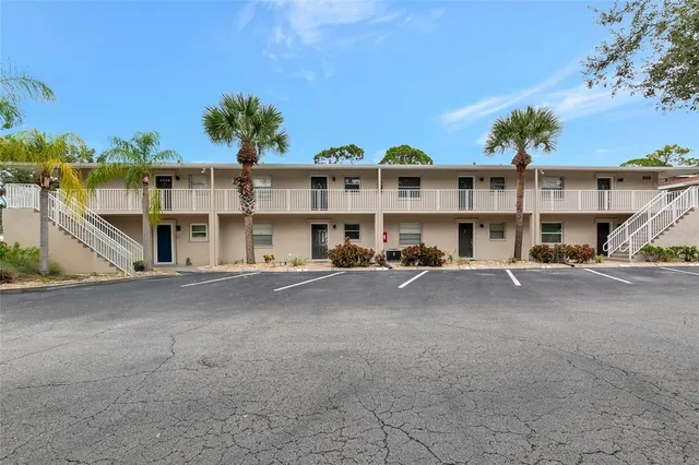 a view of a house with a street