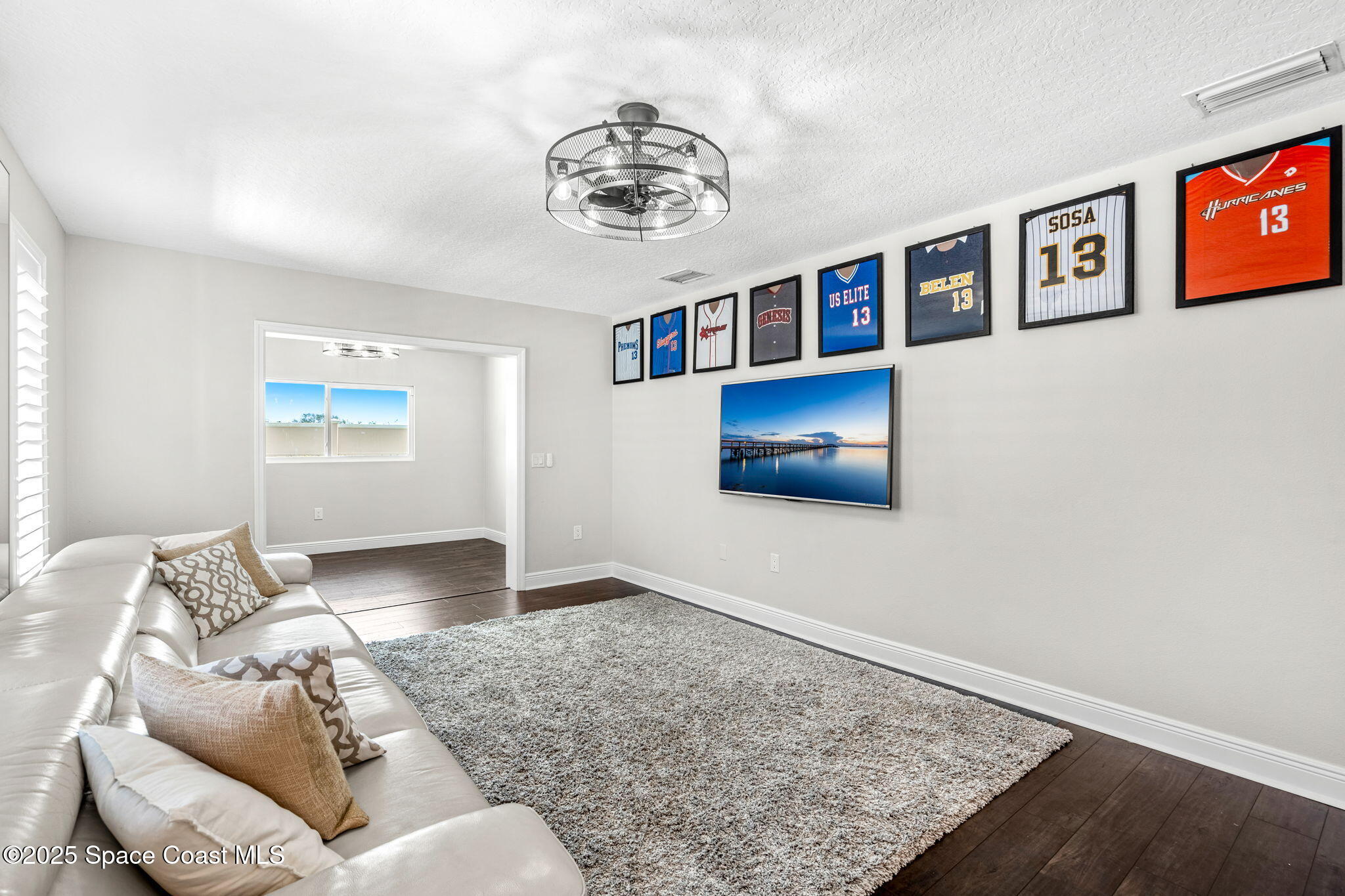 4440 Chardonnay Drive Rockledge, FL 32955 - Photo 21 of 41 a living room with furniture and a rug