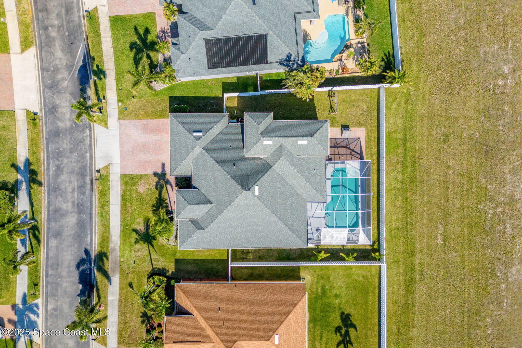 4440 Chardonnay Drive Rockledge, FL 32955 - Photo 41 of 41 an aerial view of a house with a yard