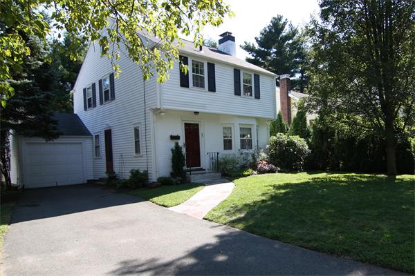 32 Thomas Road Wellesley, MA 02482 - Photo 1 of 1 a front view of a house with a yard