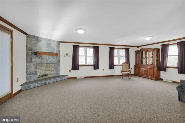 an empty room with windows