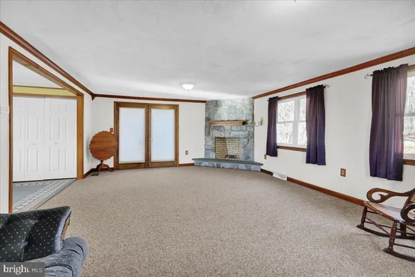 a big room with windows and closet