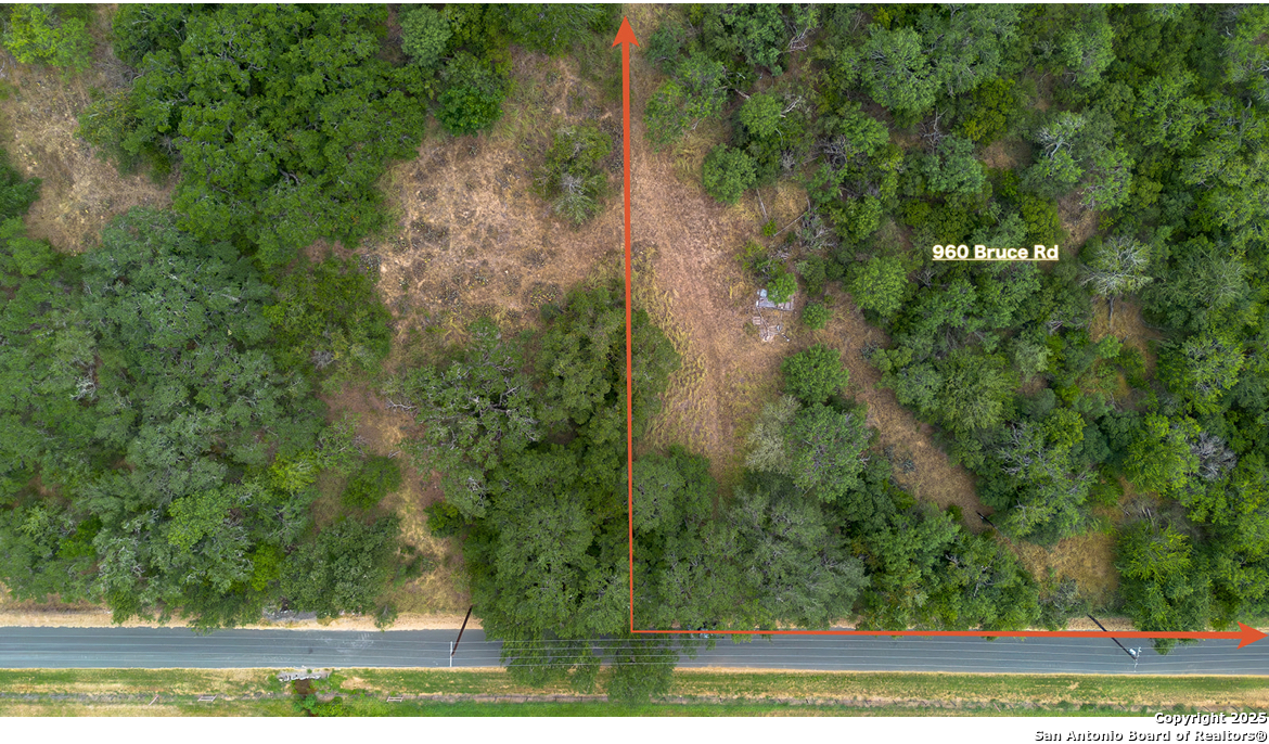 960 Bruce Road Poteet, TX 78065 - Photo 4 of 7 a view of a yard