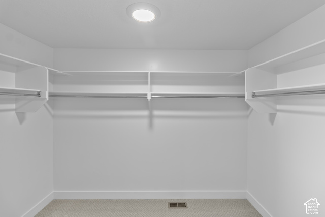 537 South 1150 West Logan, UT 84321 - Photo 25 of 33 Recessed ceiling lighting, white shelving, metal hanging rods, and light-toned carpeting