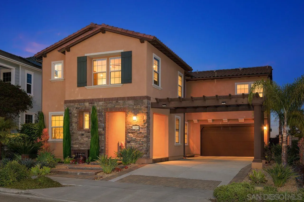13509 Cielo Ranch Road San Diego, CA 92130 - Photo 1 of 54 a front view of a house with yard