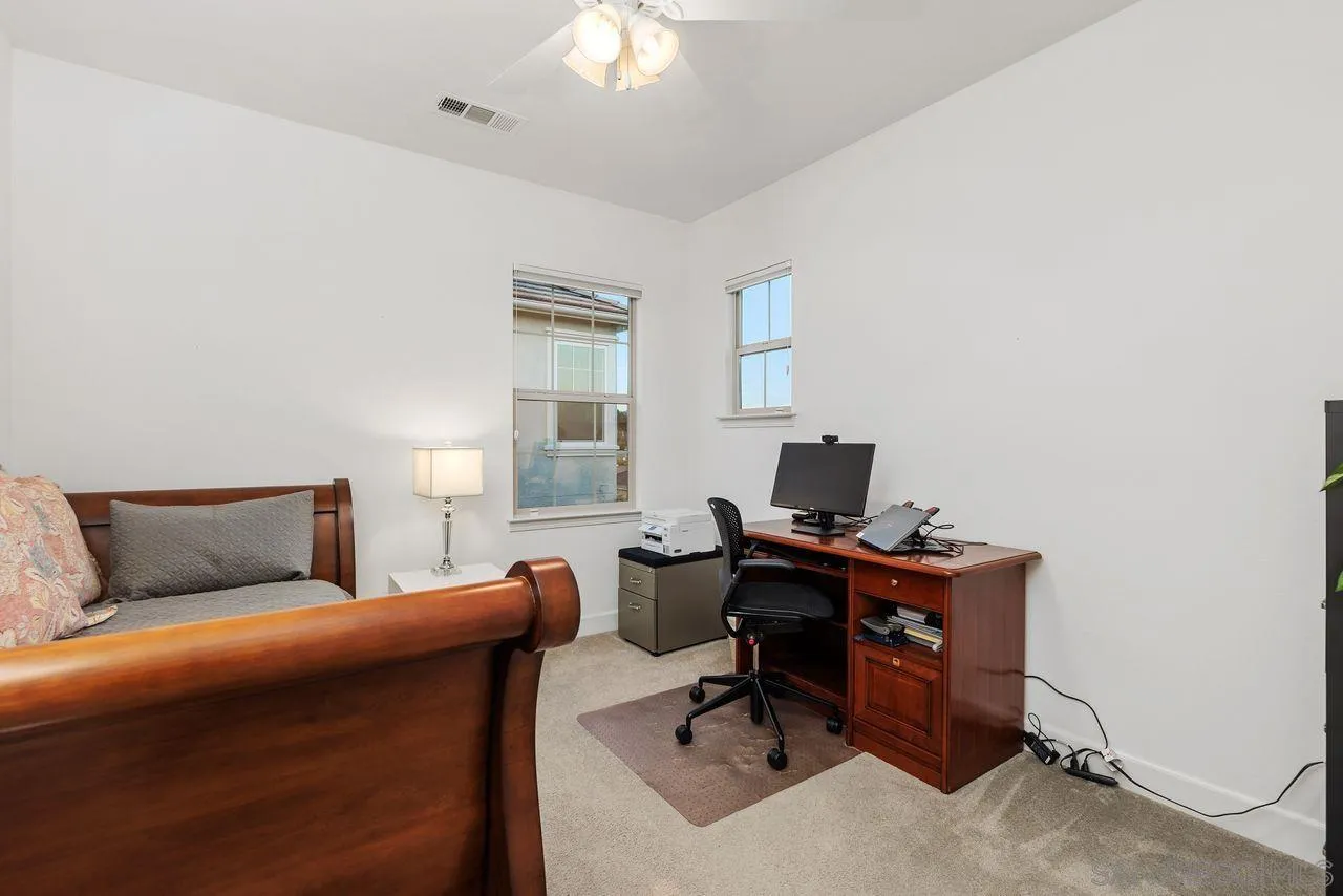 13509 Cielo Ranch Road San Diego, CA 92130 - Photo 34 of 54 a bedroom with a workspace