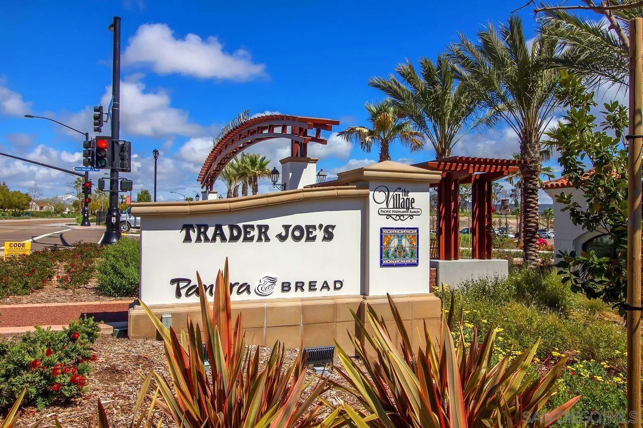 13509 Cielo Ranch Road San Diego, CA 92130 - Photo 44 of 54 a view of a sign board with buildings in the background