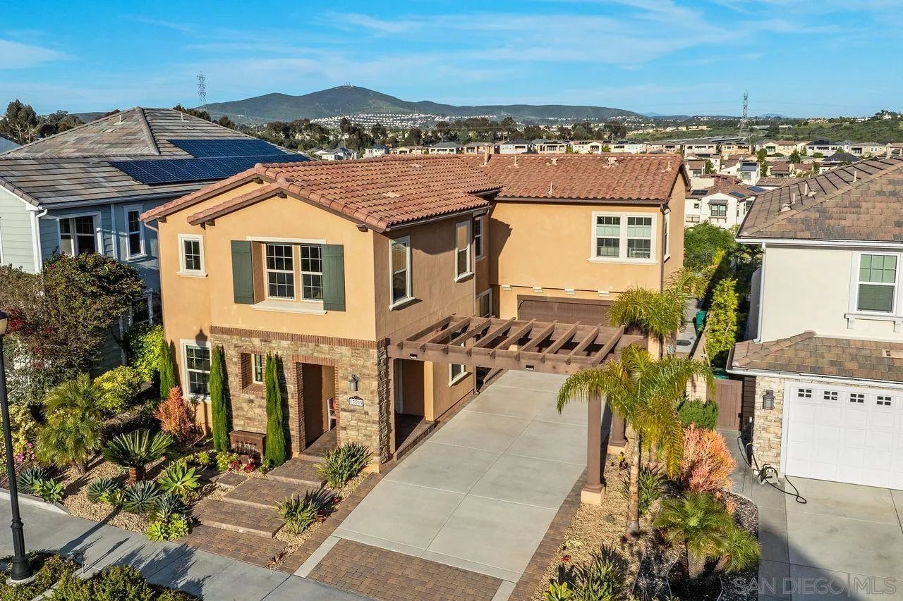 13509 Cielo Ranch Road San Diego, CA 92130 - Photo 9 of 54 an aerial view of a house with a yard lake view and mountain view