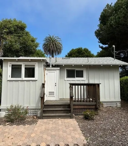 a kitchen with stainless steel appliances granite countertop a sink and a cabinets