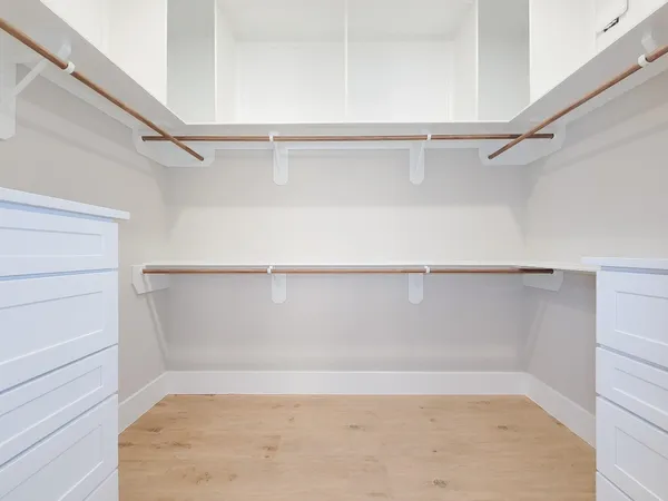 a view of an empty walk in closet