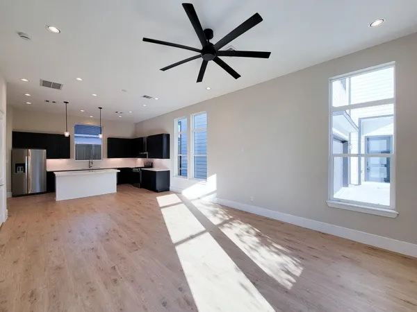a view of kitchen with furniture and window