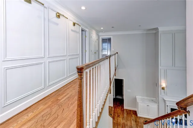 a view of a hallway with stairs